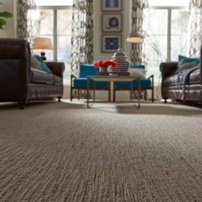 What are the significant advantages of wall-to-wall carpets?