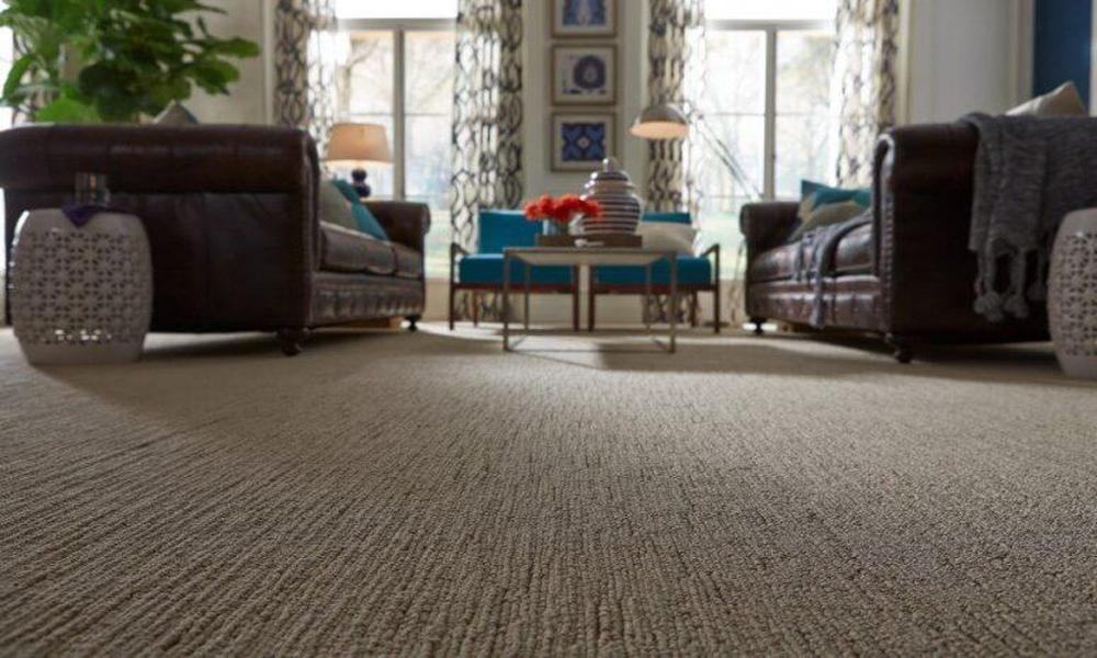 What are the significant advantages of wall-to-wall carpets
